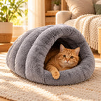 Rote Katze im grauen Iglu-Bett von Truffe & Co